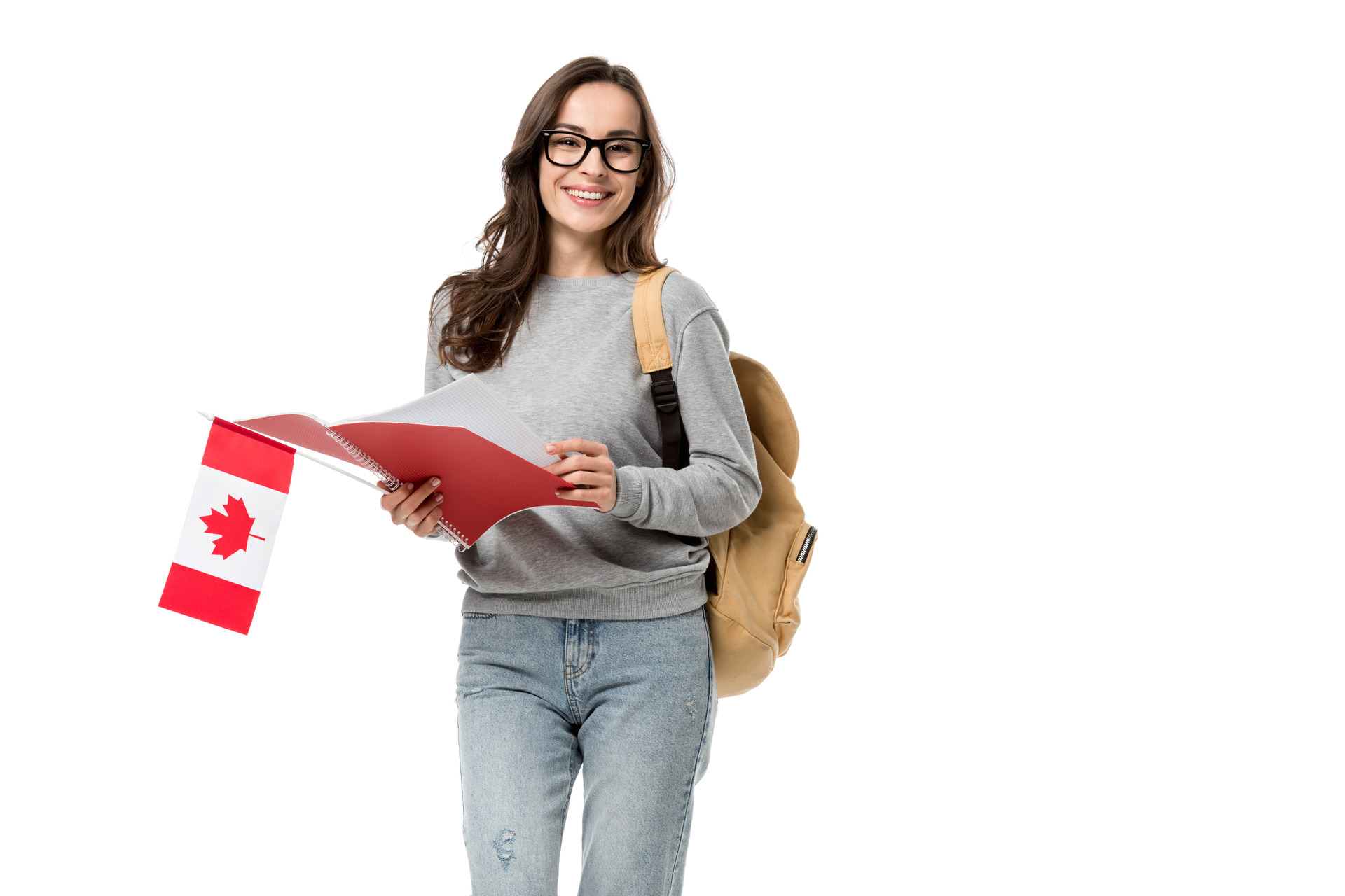 female holding canadian flag and notebook