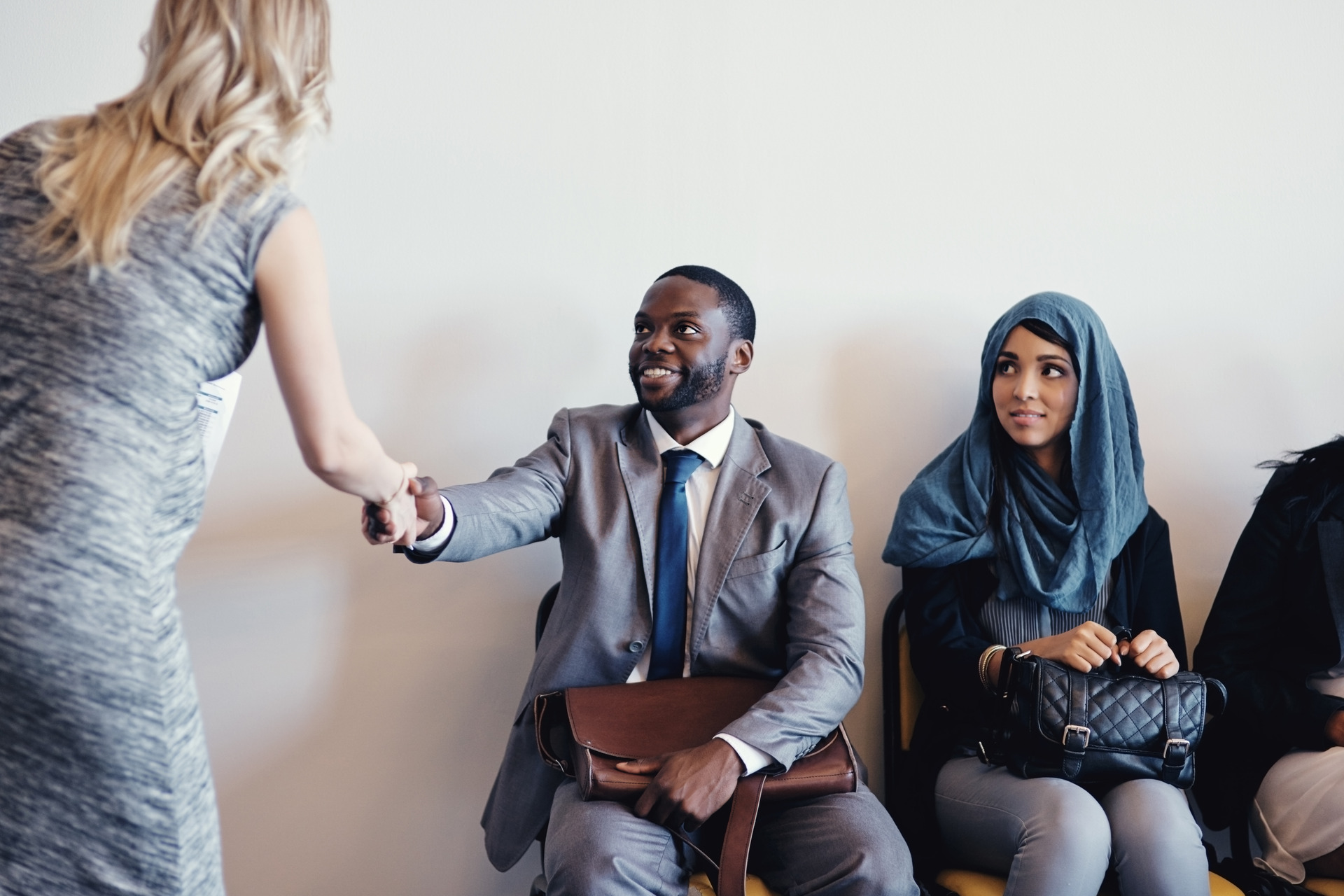 lawyer shaking hands with colleague