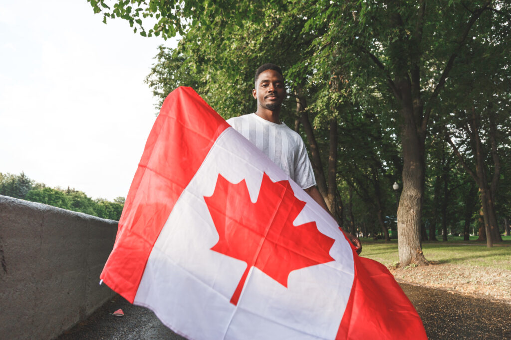 man with canadian flag