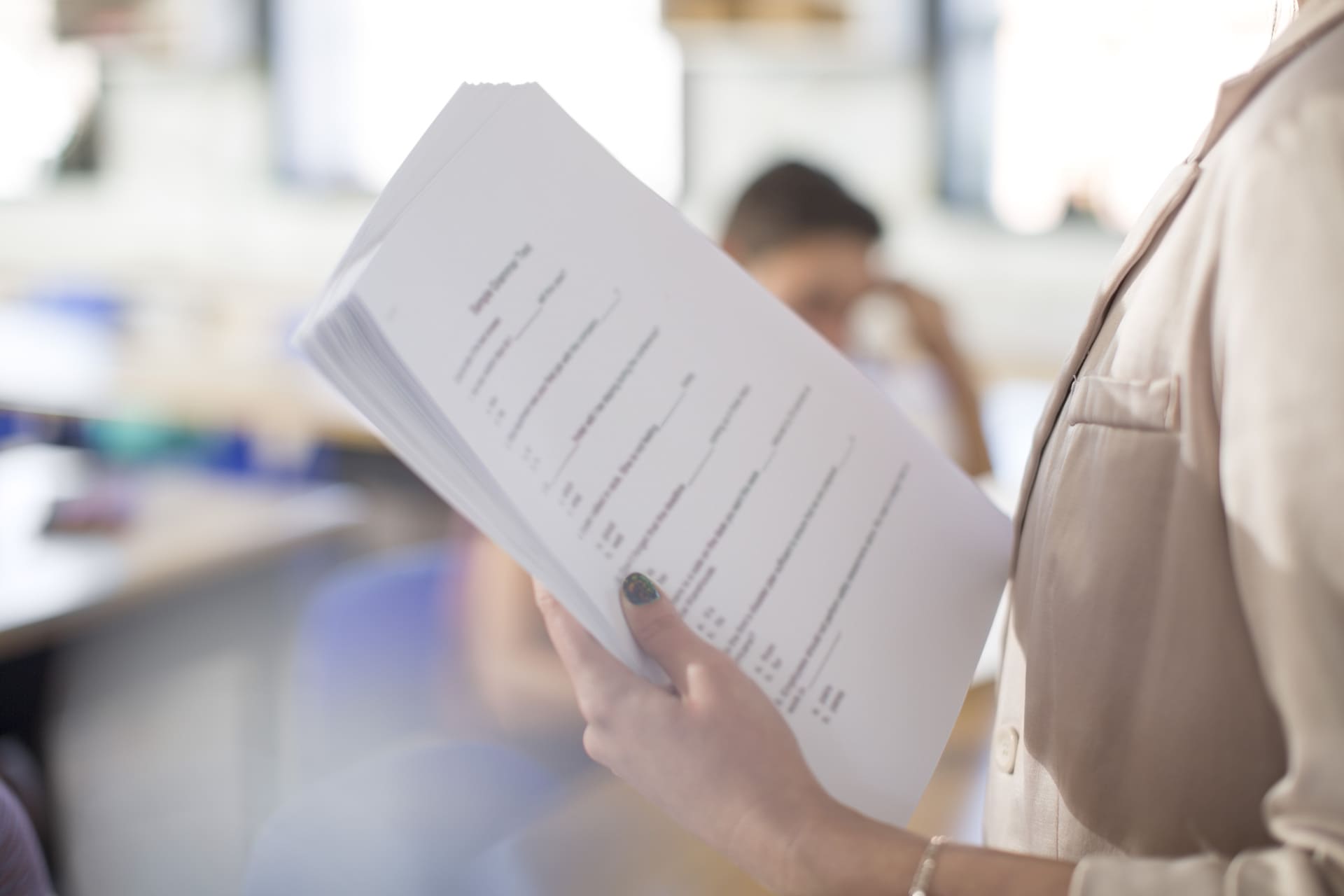 Woman holding papers