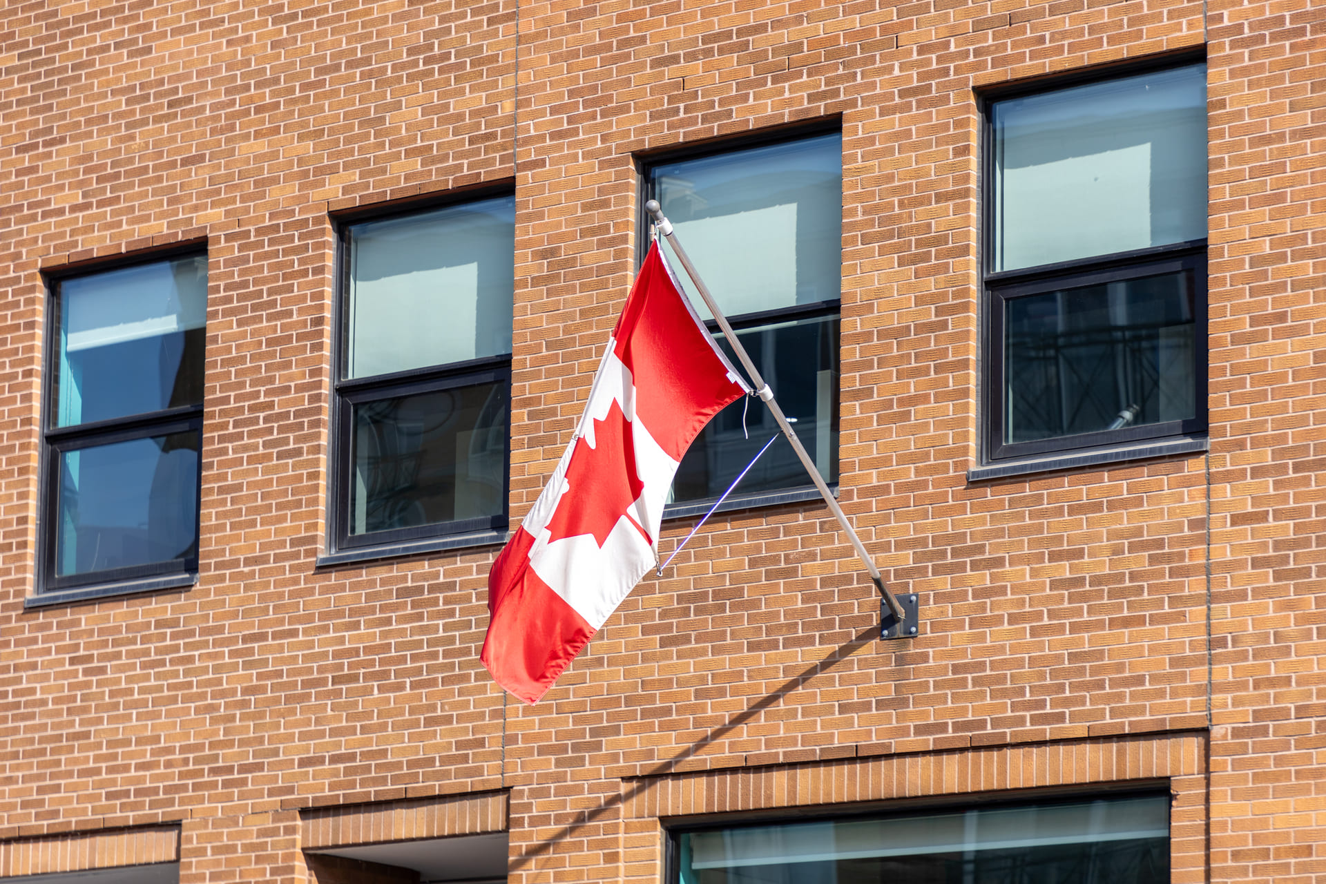 Canadian flag on building