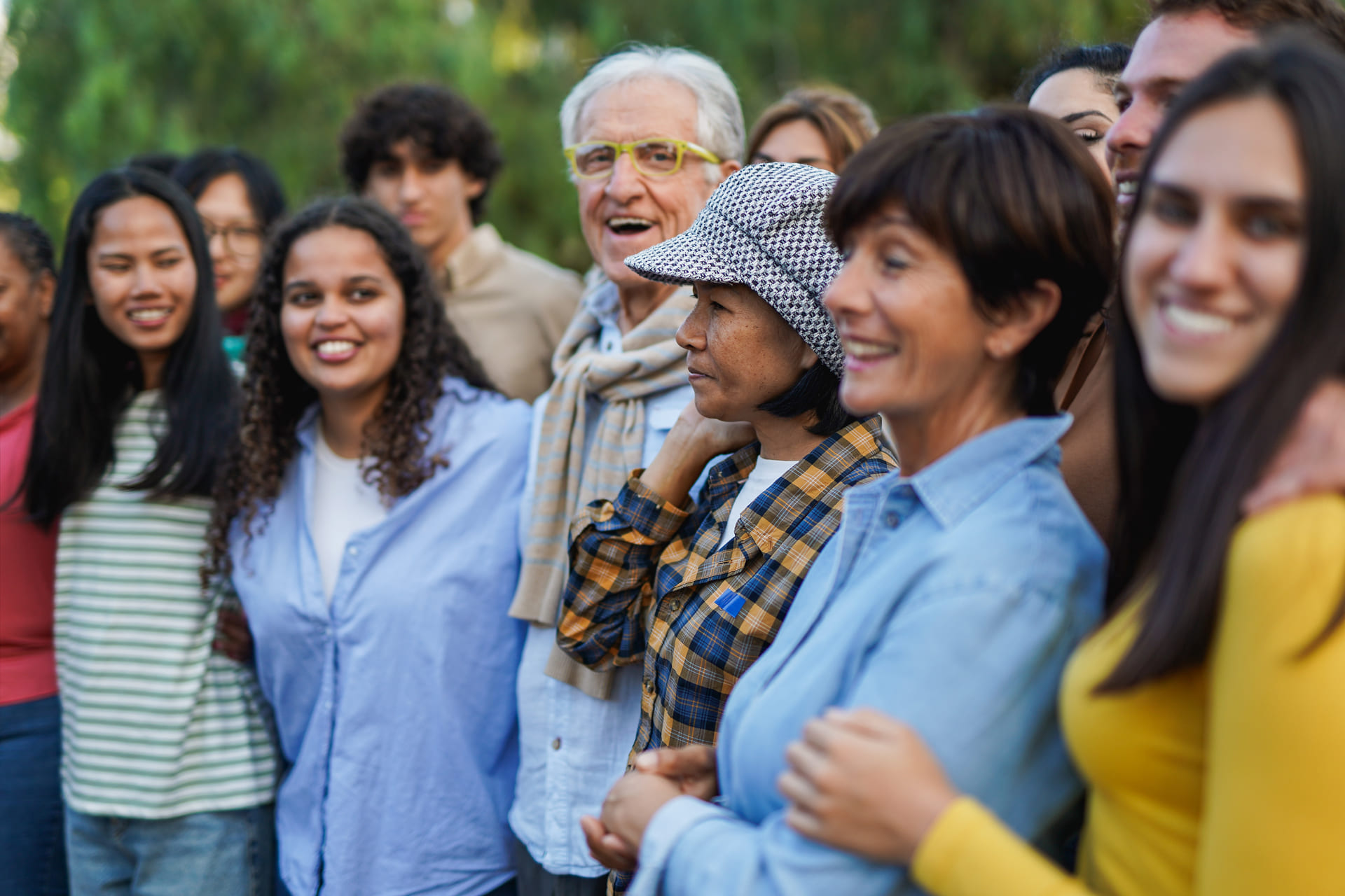 multiracial people standing, representing the multiethnic nature of Canada