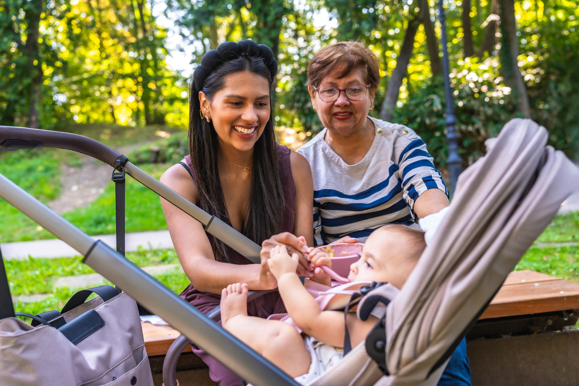 Latin family enjoying time with their newborn child