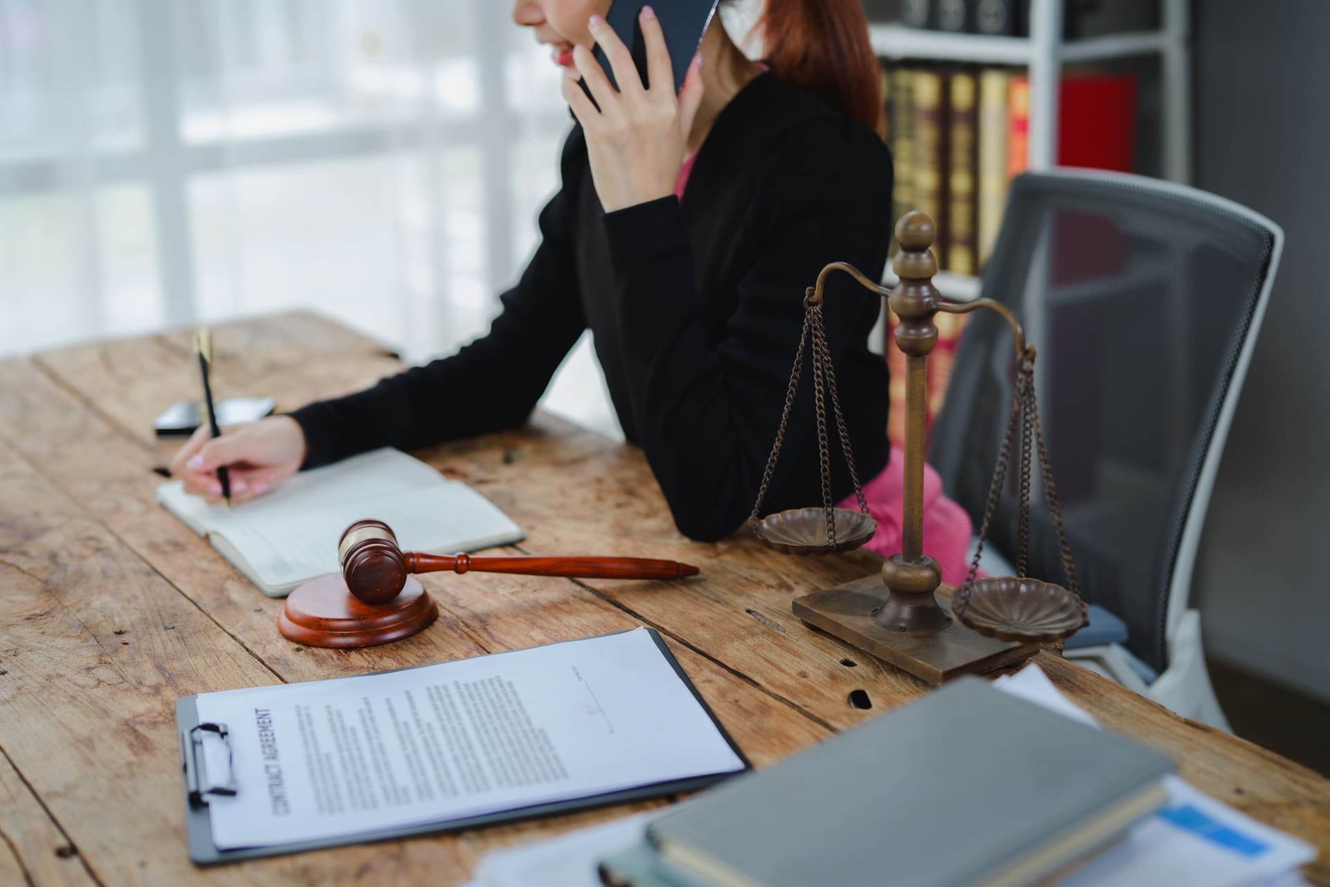 lawyer working on immigration-related issues at office