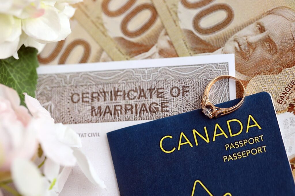 canadian certificate of marriage document and wedding ring