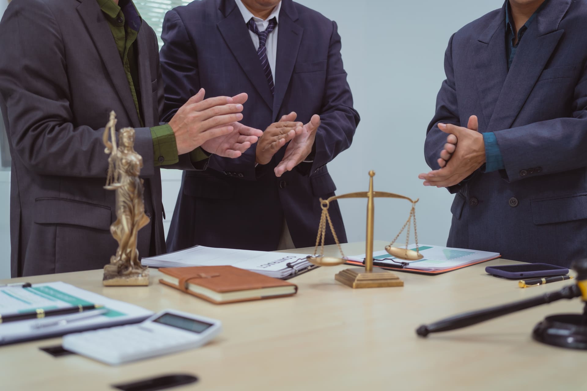Three lawyers on a meeting