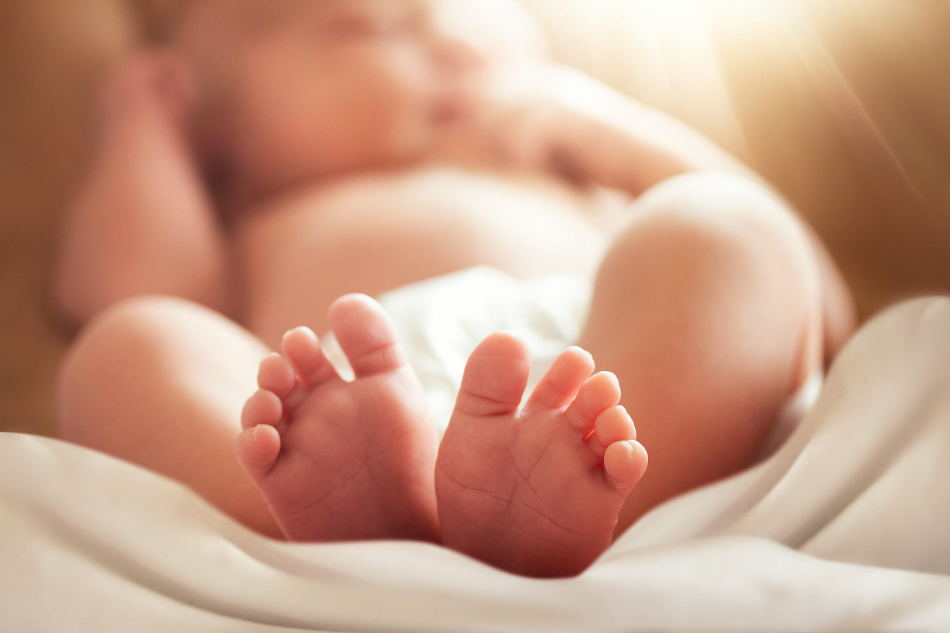 newborn baby (feet in picture)
