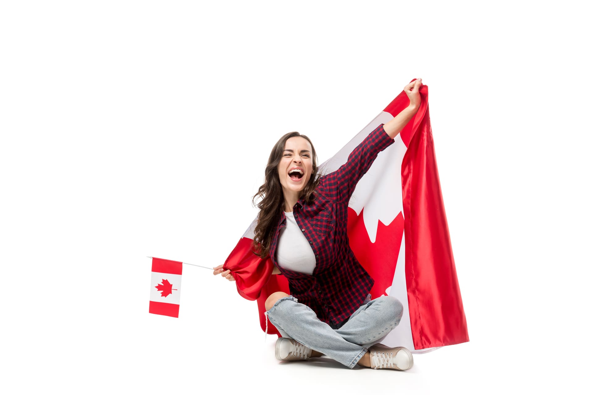 excited woman with Canadian flag on back