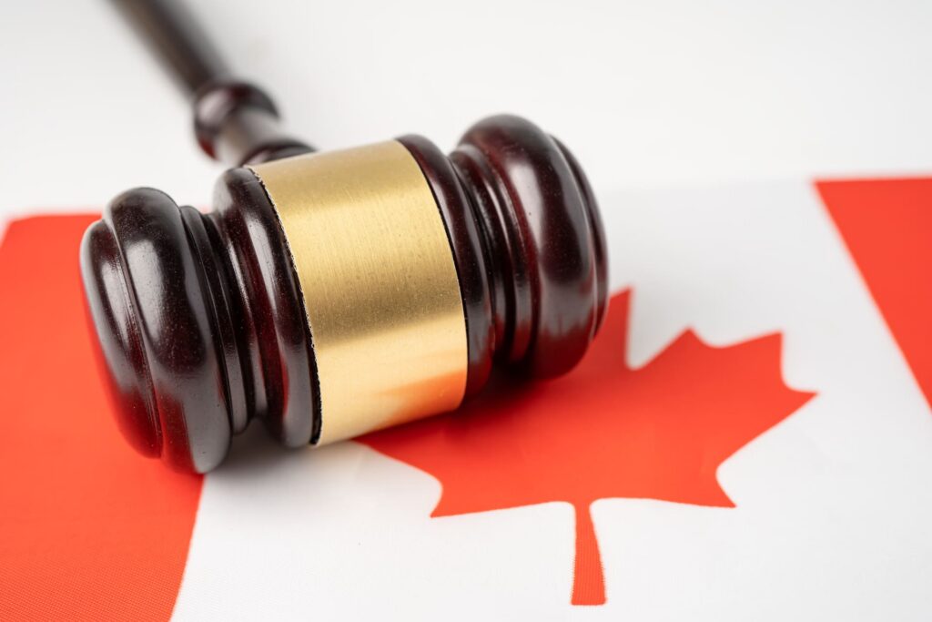 gavel-on-canadian-flag-symbolizes-law-and-justice