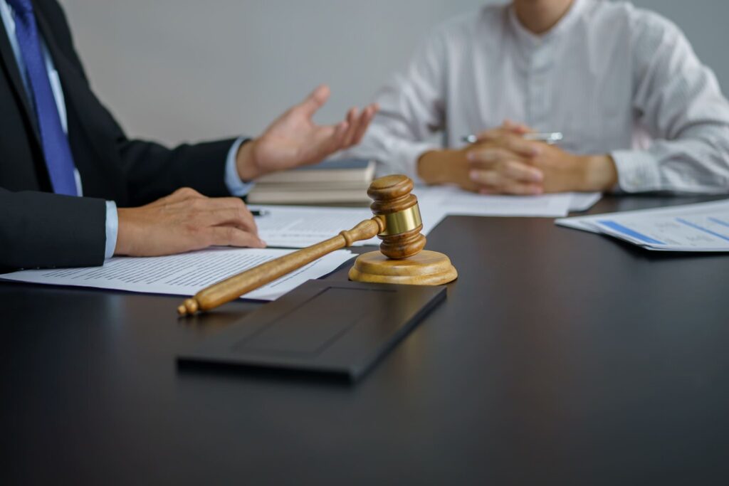 corporate-legal-discussion-with-gavel-on-desk