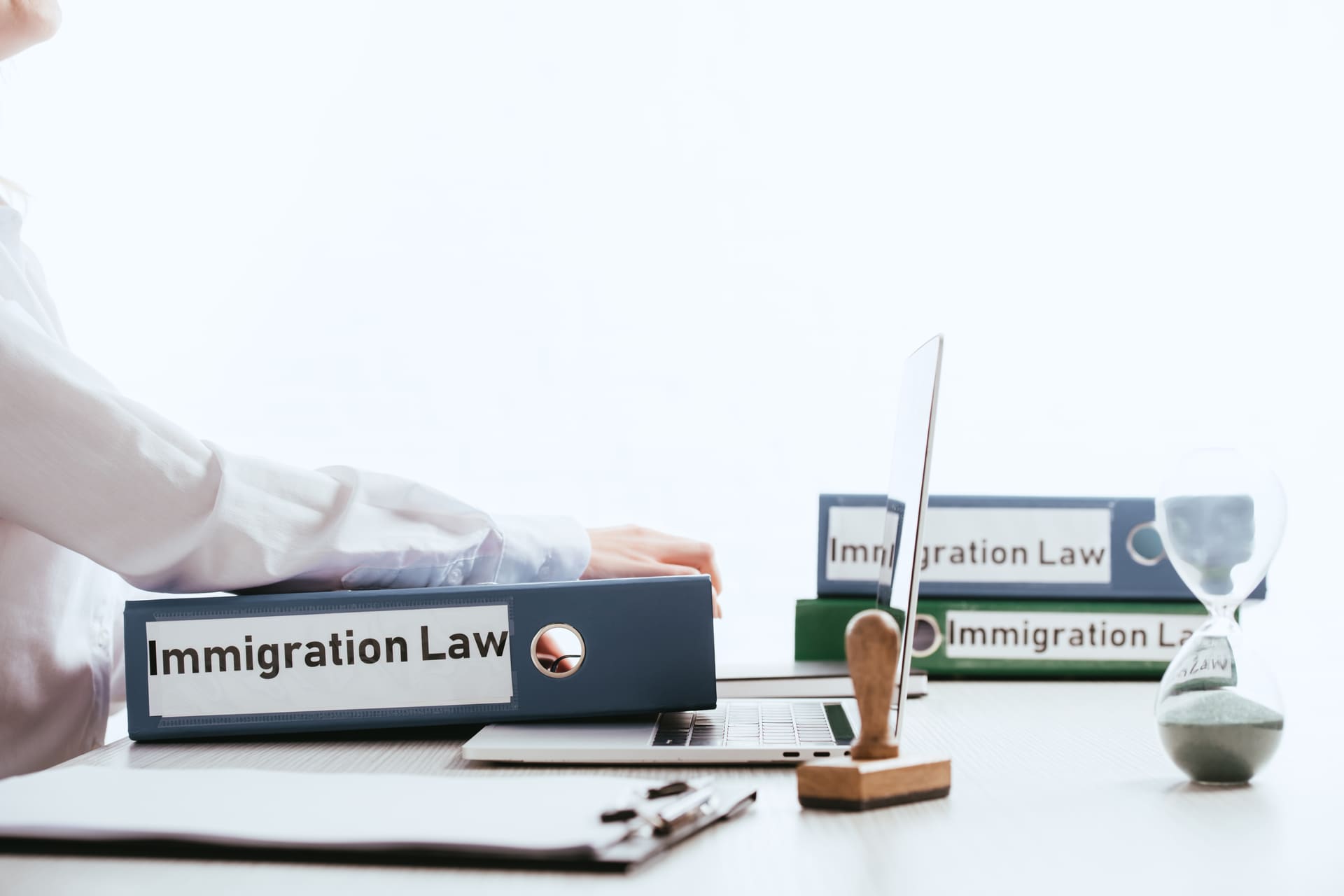 immigration-law-documents-and-laptop-on-desk