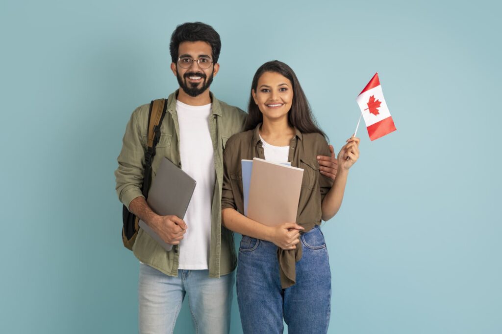 smiling-man-and-woman-with-flag-and-books