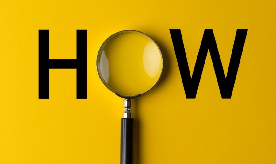 word how typed in a yellow background with magnifying glass